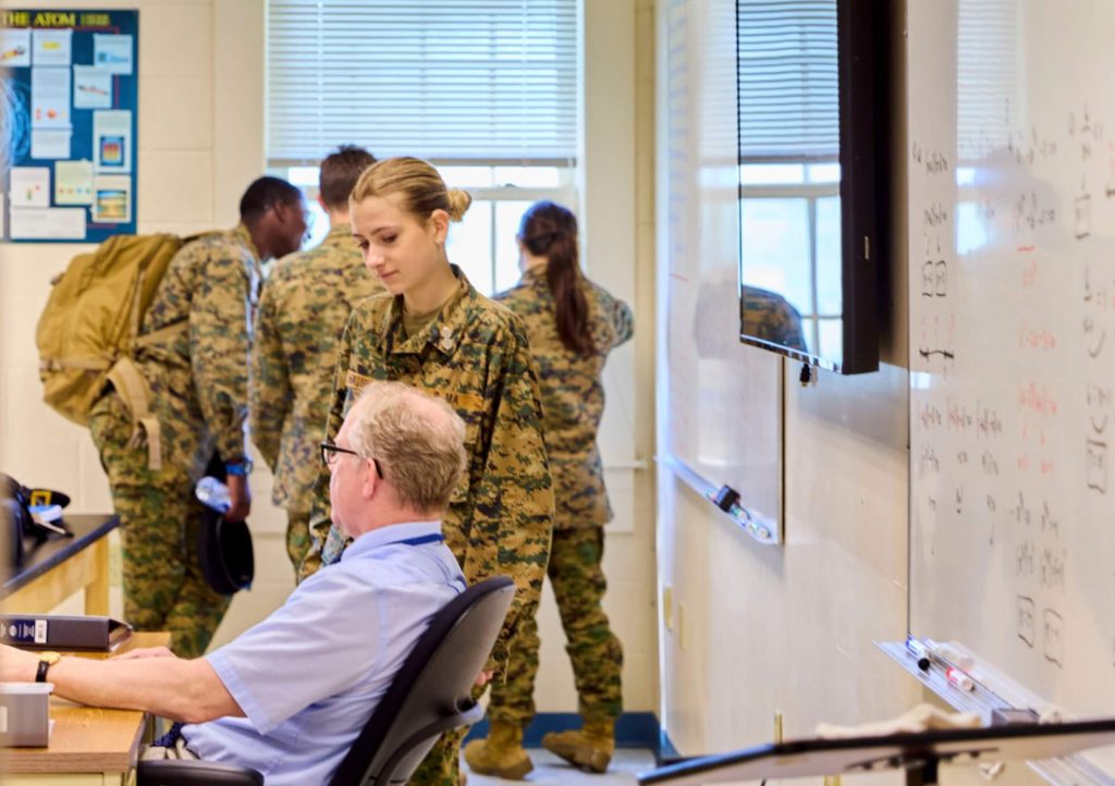 A college counselor advising a student at R-MA