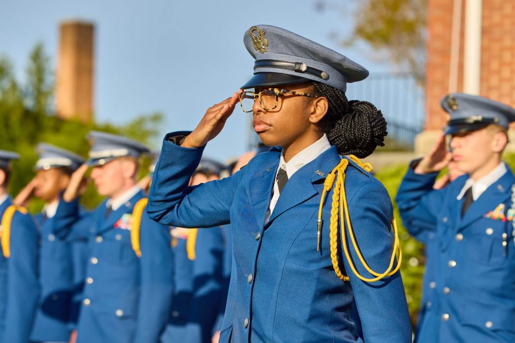 A group of R-MA private boarding school cadets in leadership training activities outdoors
