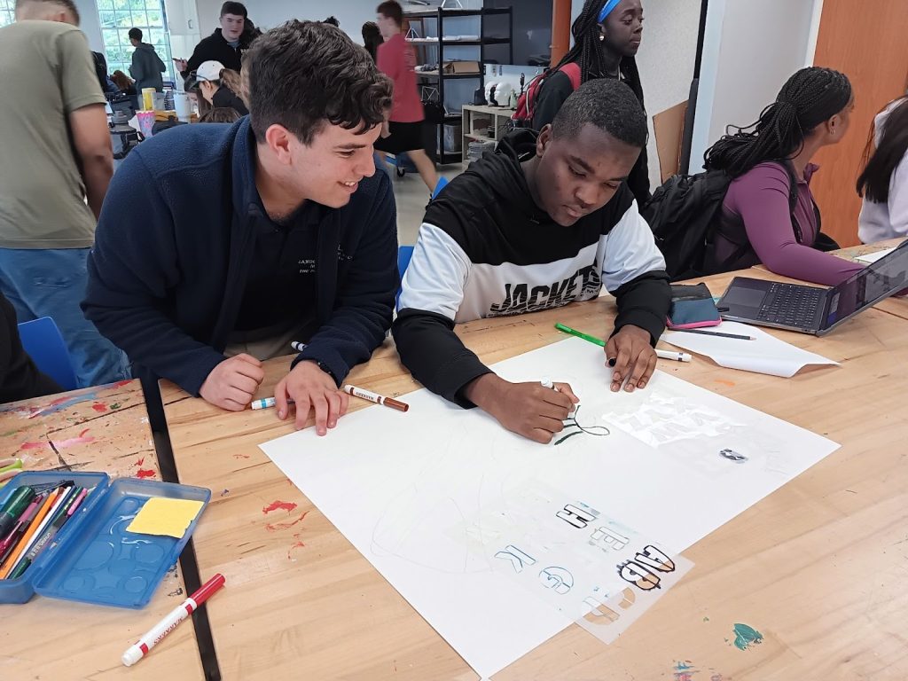 R-MA Interact Club students participating in a local fundraiser