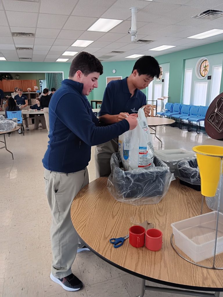 R-MA students working together on a service initiative