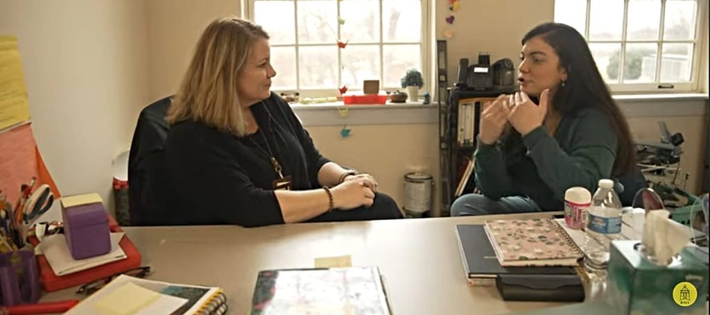 A group of R-MA faculty supporting students in a close-knit boarding school environment