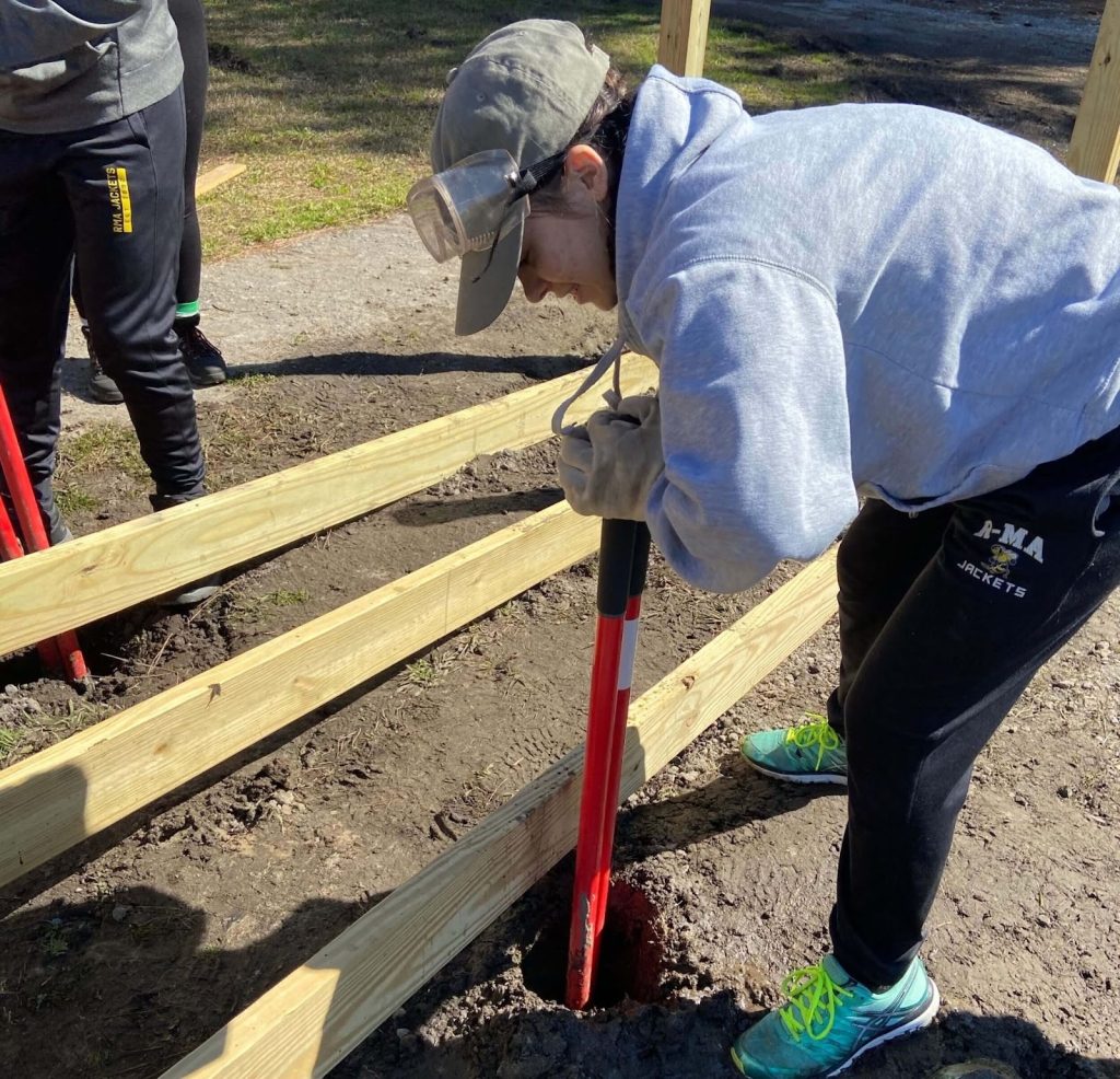 Cadets from our day and boarding school repairing community infrastructure