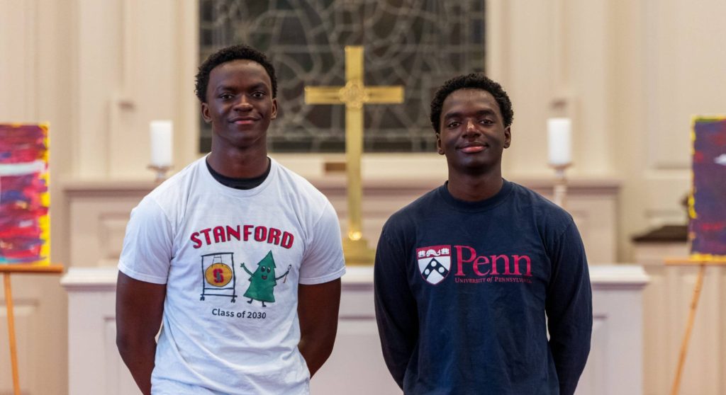 A pair of Randolph-Macon Academy students celebrating college acceptances to Stanford and the University of Pennsylvania during Decision Day