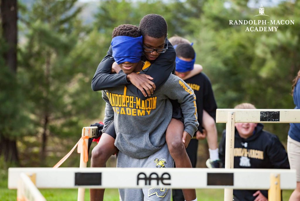 Randolph-Macon Academy students complete a trust-building leadership exercise that develops resilience, teamwork, and durable skills for lifelong success.