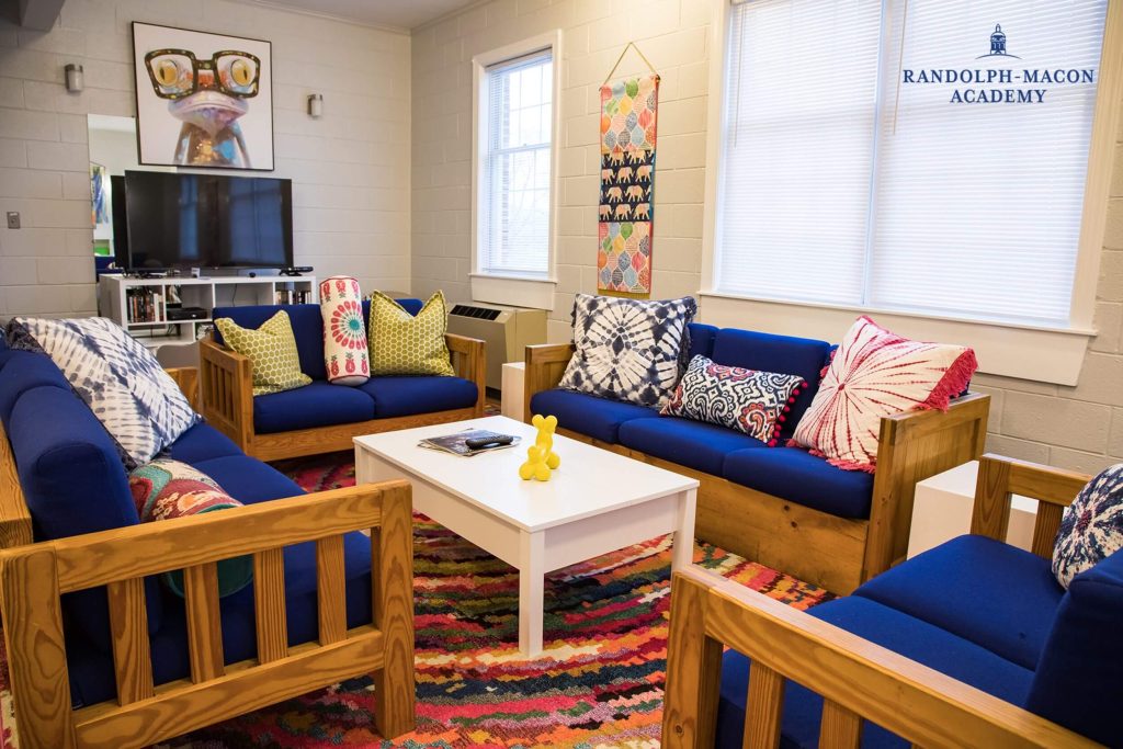 A furnished student lounge in a Randolph-Macon Academy dormitory, showing a welcoming shared space for boarding students.