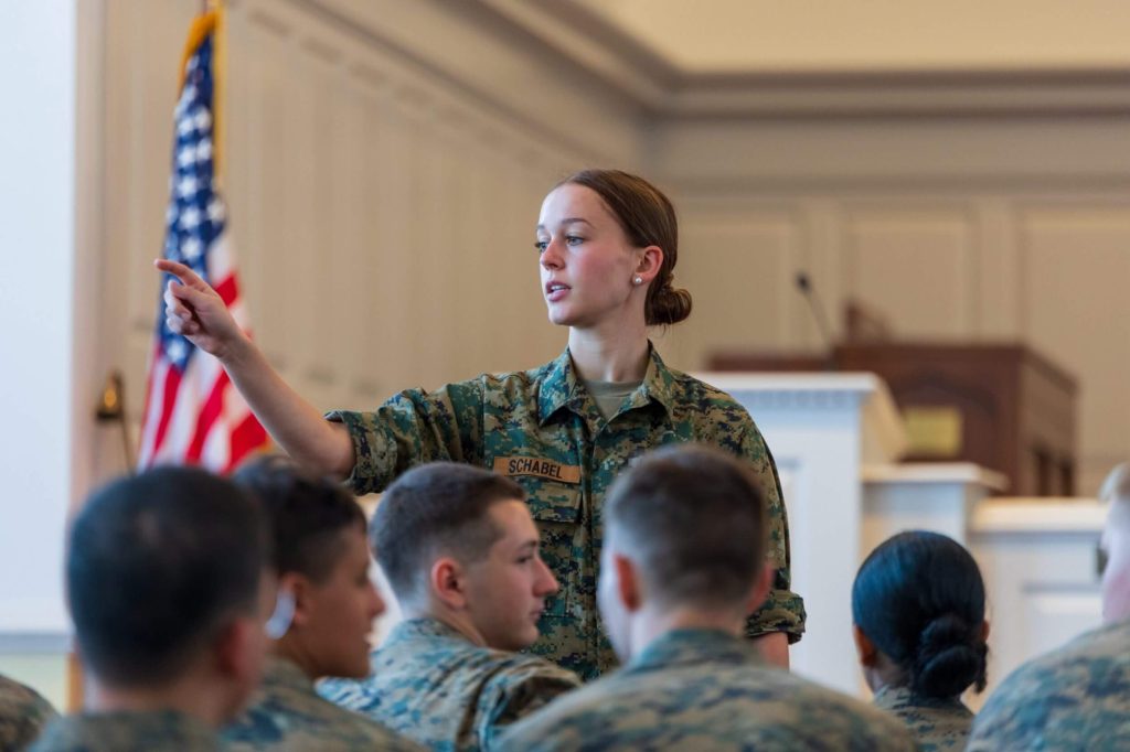 A female Randolph-Macon Academy cadet addressing fellow cadets during a leadership training session.