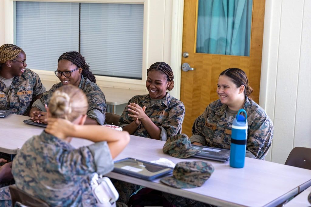 A group of Randolph-Macon Academy cadets participating in a small-group discussion that supports academic planning, collaboration, and college readiness.