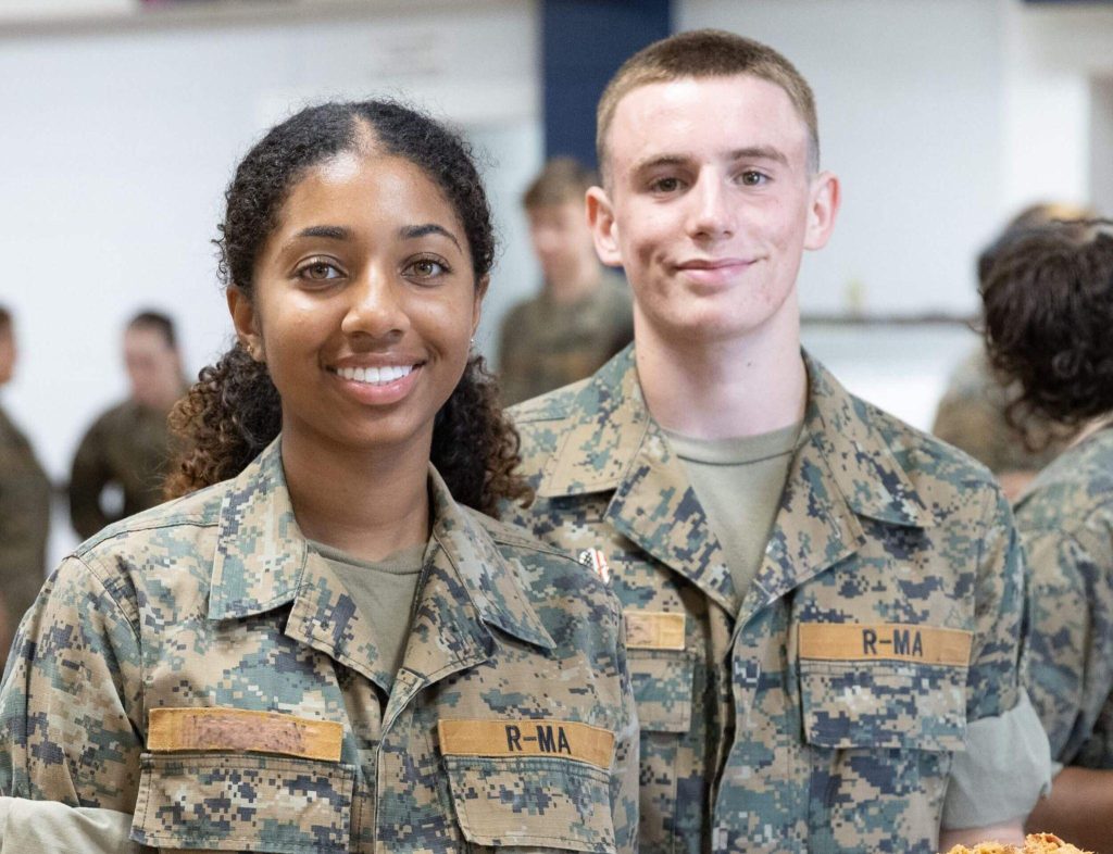 Two Randolph-Macon Academy cadets standing together during a school activity.